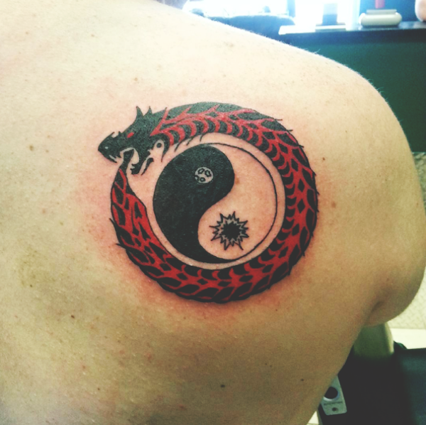 Beautiful Ouroboros Tattoo Ideas with Meanings2
