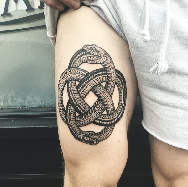 Beautiful Ouroboros Tattoo Ideas with Meanings11