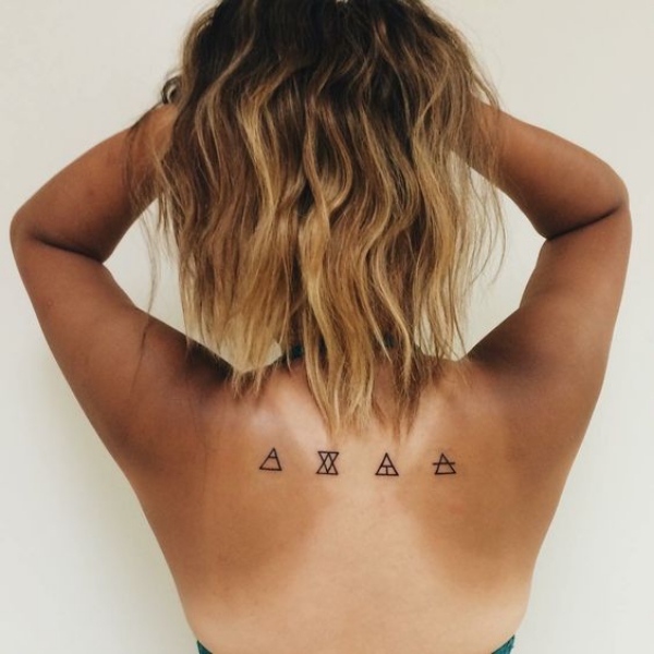 Tiny Tattoos with Gigantic Meanings