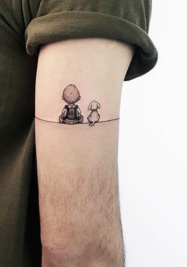 Kid with a Dog Tattoo: Small Tattoo Designs for Men with Deep Meanings